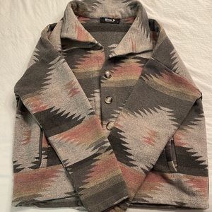 Size Small. Worn 2 times fits true to size just on the crop jacket side.